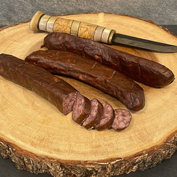Hot smoked reindeer sausage with stinging nettle